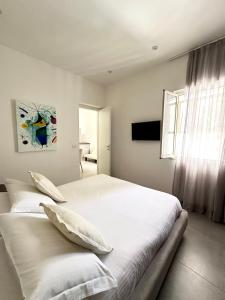 Postel nebo postele na pokoji v ubytování Petra Maris B&B