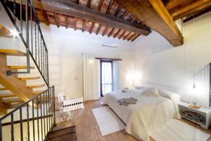 Кровать или кровати в номере Agriturismo La Peonia