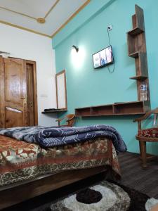 TV a/nebo společenská místnost v ubytování HOTEL Cedar Heritage