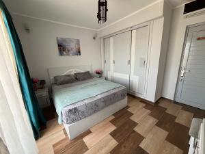 Letto o letti in una camera di PortghalibFlat