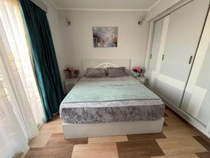 Letto o letti in una camera di PortghalibFlat