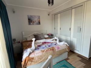 Letto o letti in una camera di PortghalibFlat