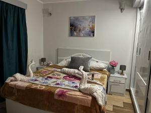 Letto o letti in una camera di PortghalibFlat