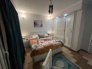 Letto o letti in una camera di PortghalibFlat