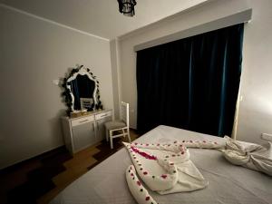 Letto o letti in una camera di PortghalibFlat