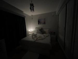 Letto o letti in una camera di PortghalibFlat