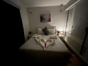 Letto o letti in una camera di PortghalibFlat