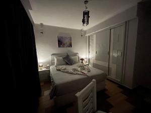 Letto o letti in una camera di PortghalibFlat