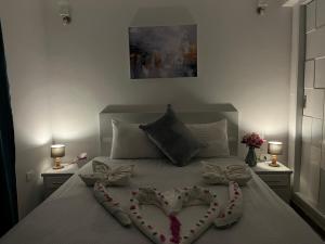 Letto o letti in una camera di PortghalibFlat