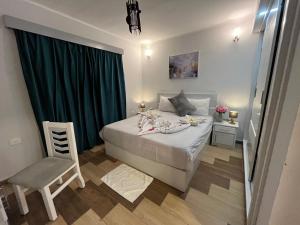 Letto o letti in una camera di PortghalibFlat