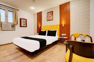 Postel nebo postele na pokoji v ubytování Super Hotel JP Palace