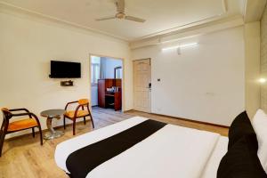 Postel nebo postele na pokoji v ubytování Super Hotel JP Palace