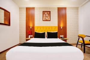 Postel nebo postele na pokoji v ubytování Super Hotel JP Palace