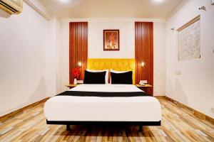 Postel nebo postele na pokoji v ubytování Super Hotel JP Palace