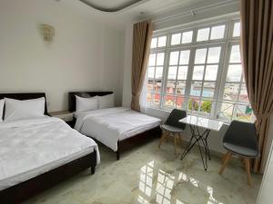 Giường trong phòng chung tại IvySnow Đà Lạt +43 ảnh