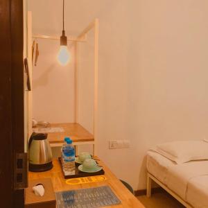 Voodi või voodid majutusasutuse BaobaBed Lodge, Yangon toas