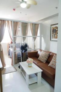 Posezení v ubytování Yvonne Condo at Primeworld Lapu Lapu, Mactan Cebu