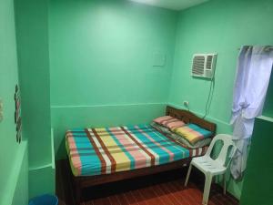 Katil atau katil-katil dalam bilik di SEVENNE INN TRANSIENT House +25 gambar