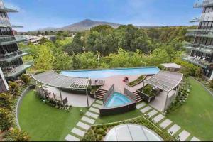 an aerial view of a house with a swimming pool at City Comfy Apartment in Canberra