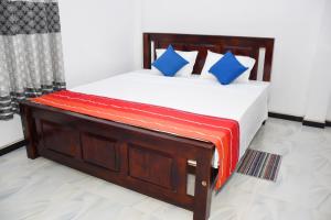 Postel nebo postele na pokoji v ubytování Sasanda Villa and Yala Safari Place