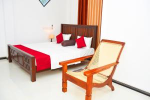 Postel nebo postele na pokoji v ubytování Sasanda Villa and Yala Safari Place
