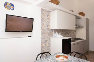 A kitchen or kitchenette at Appartamento Mia