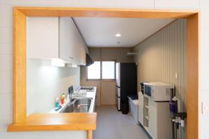 Eldhús eða eldhúskrókur á Max11名宿泊可能 一軒家を丸ごと貸切 BBQ可能 ファミリー歓迎 ANGO NASU I