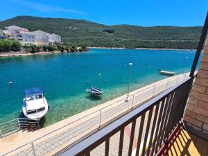 a view of a river with boats in the water at Apartmani Niko in Neum