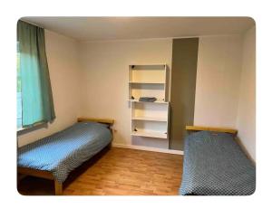 Postel nebo postele na pokoji v ubytování Zimmer 4