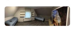 TV a/nebo společenská místnost v ubytování Zimmer 4 + 1 fotografie