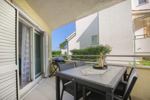 Balkón alebo terasa v ubytovaní Comfortable apartment near the beach