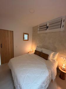 Ένα ή περισσότερα κρεβάτια σε δωμάτιο στο Kira Suite +24 φωτογραφίες