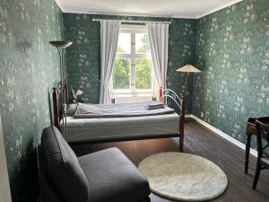 Postel nebo postele na pokoji v ubytování Södra Lund B&B