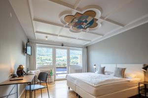 Katil atau katil-katil dalam bilik di Q! Hotel Maria Theresia