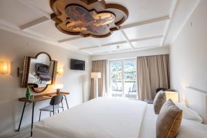 Postel nebo postele na pokoji v ubytování Q! Hotel Maria Theresia