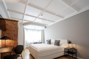 Katil atau katil-katil dalam bilik di Q! Hotel Maria Theresia