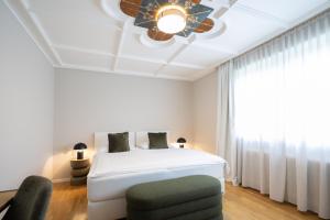 Katil atau katil-katil dalam bilik di Q! Hotel Maria Theresia