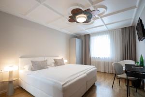Katil atau katil-katil dalam bilik di Q! Hotel Maria Theresia