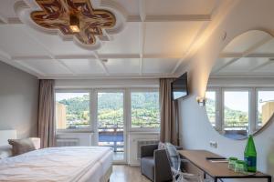 Katil atau katil-katil dalam bilik di Q! Hotel Maria Theresia