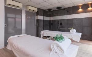 Кровать или кровати в номере Hotel Spa Galatea
