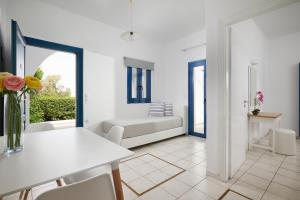 Postel nebo postele na pokoji v ubytování Artemis Apartments