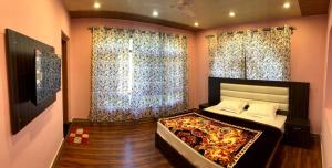 Voodi või voodid majutusasutuse Damir Palace toas