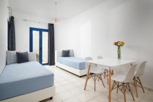 Postel nebo postele na pokoji v ubytování Artemis Apartments