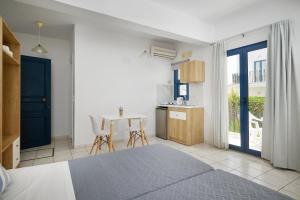 Kuchyň nebo kuchyňský kout v ubytování Artemis Apartments