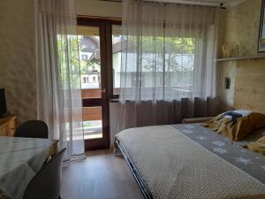 Postel nebo postele na pokoji v ubytování Fradusta 213