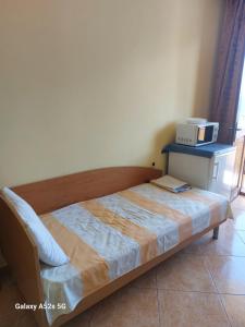 Postel nebo postele na pokoji v ubytování Homestay Kostadinov