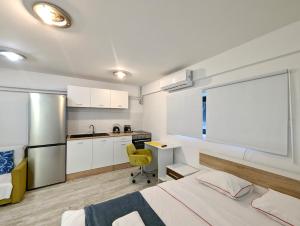 Η κουζίνα ή μικρή κουζίνα στο Four Studios +23 φωτογραφίες