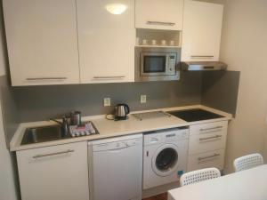 Kuchyň nebo kuchyňský kout v ubytování Apartmán ÁJA - Lipno nad Vltavou