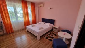 Postel nebo postele na pokoji v ubytování Aurex