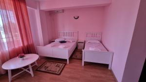 Postel nebo postele na pokoji v ubytování Aurex